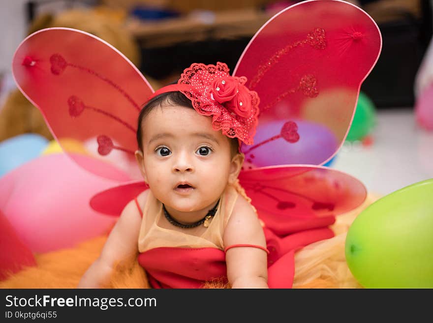 Portrait of Indian baby dressed as an angel