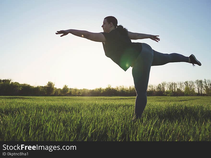 Overweight Woman Dancing Outdoors. Freedom Concept