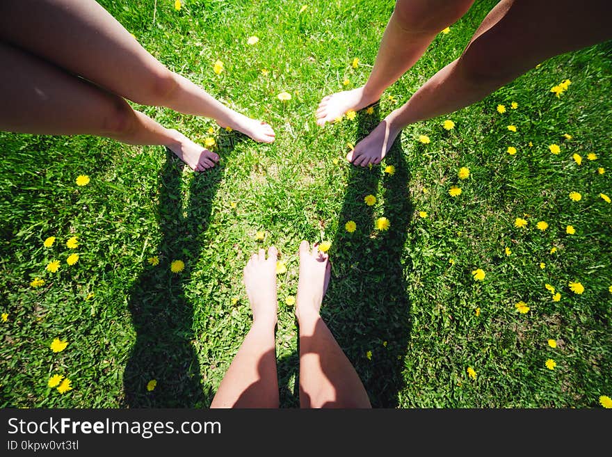 feet enjoying summer field and sun