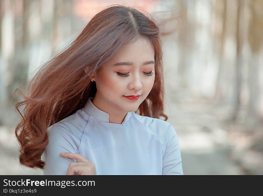 Photo of Woman Wearing White Top