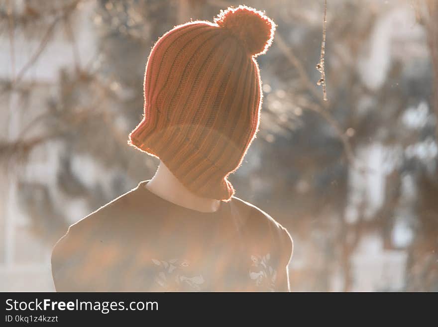 Photography of a Person Wearing Bonnet