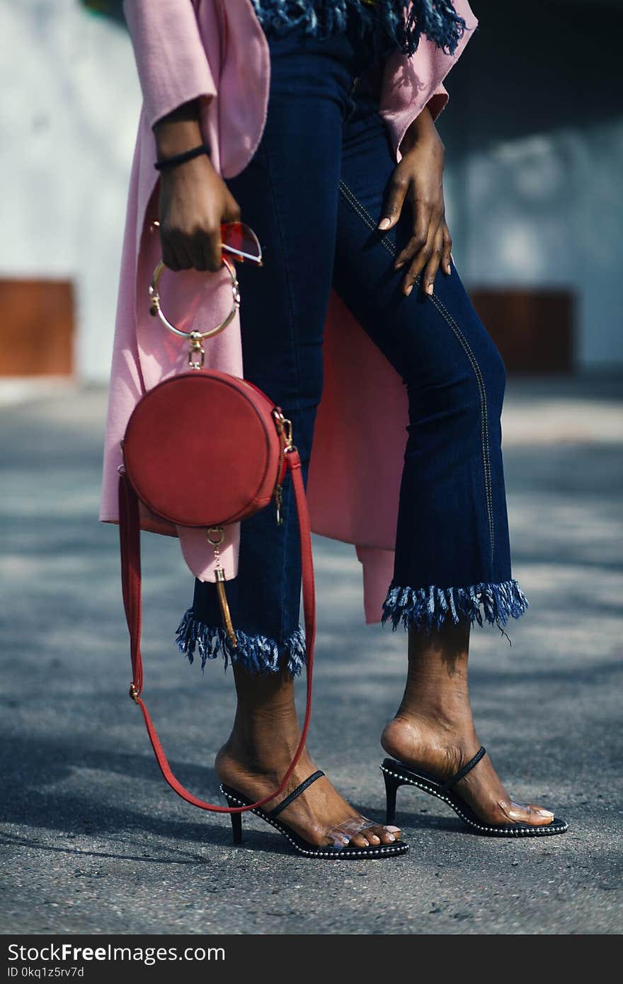 Woman Holding Round Leather 2-way Handbag