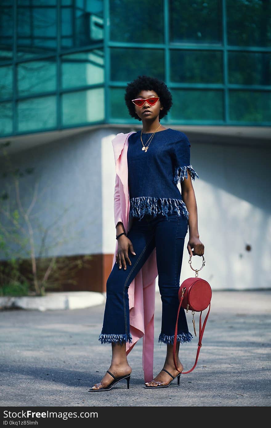 Shallow Focus Photography of Woman in Blue Shirt