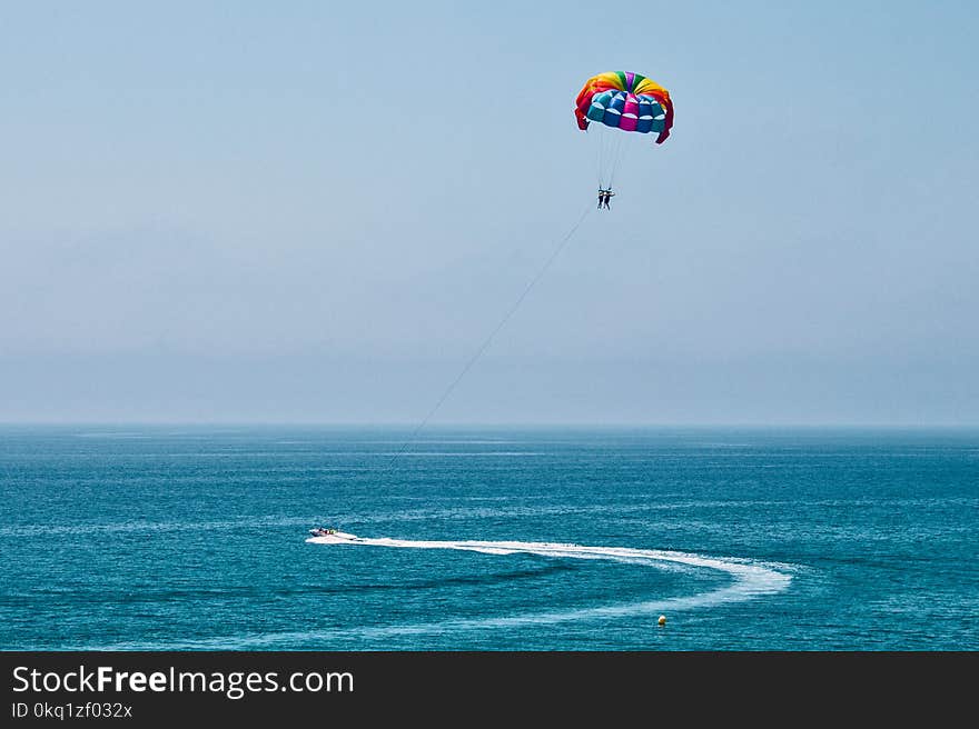 Two People Parasailing