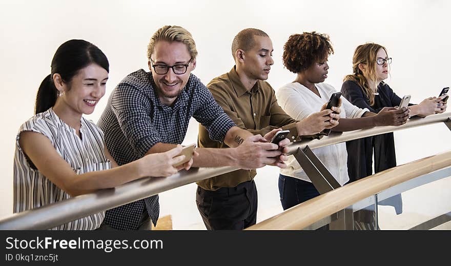 Five Person Holding Mobile Phones