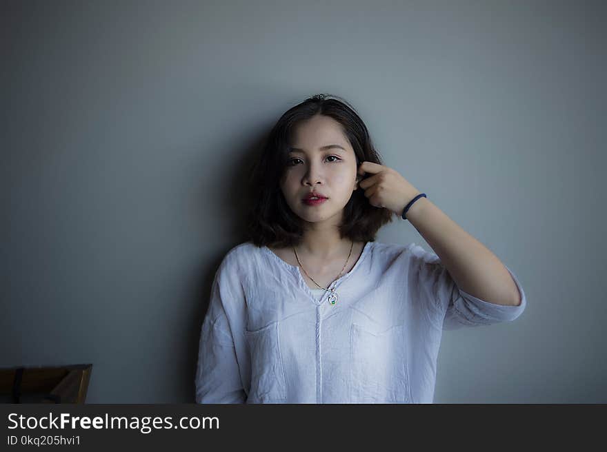 Woman Wearing Blue Long-sleeved Shirt