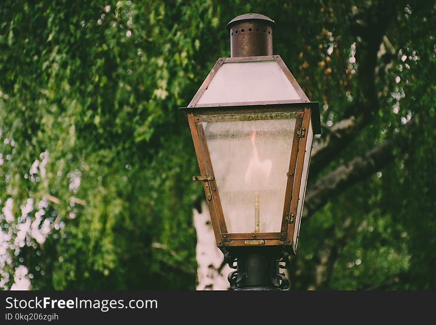 Lighted Brown Metal Post Lamp