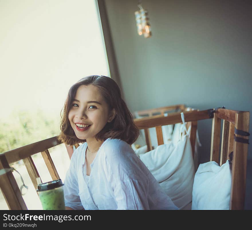 Woman in White Long-sleeved Top