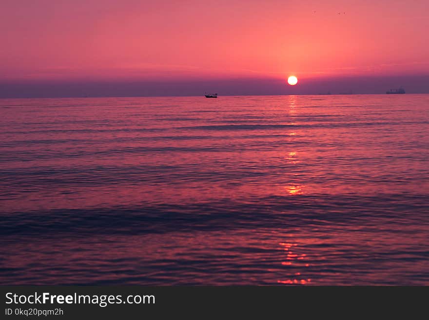 Calm Body of Water at Golden Hour