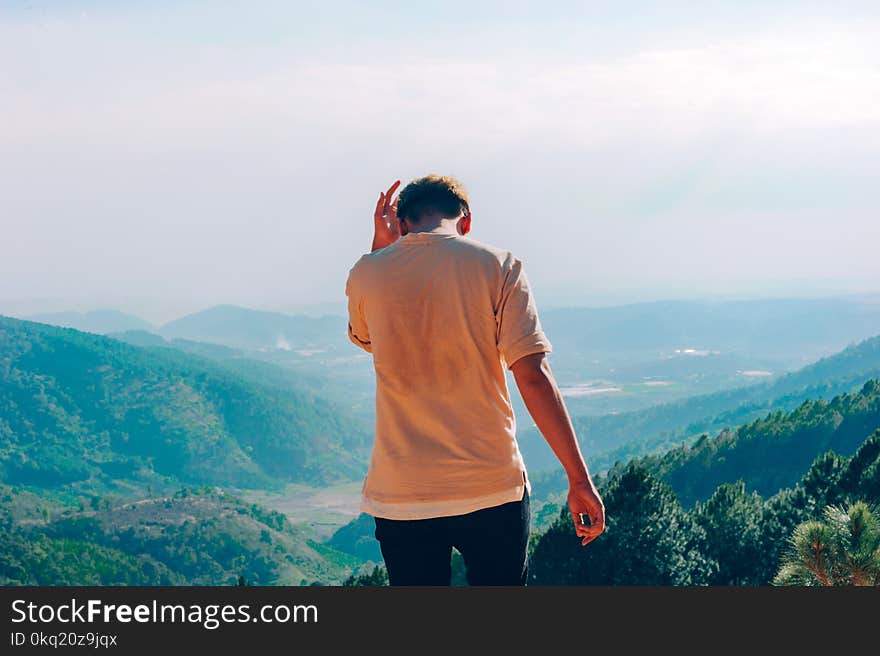 Person Wearing Brown Shirt