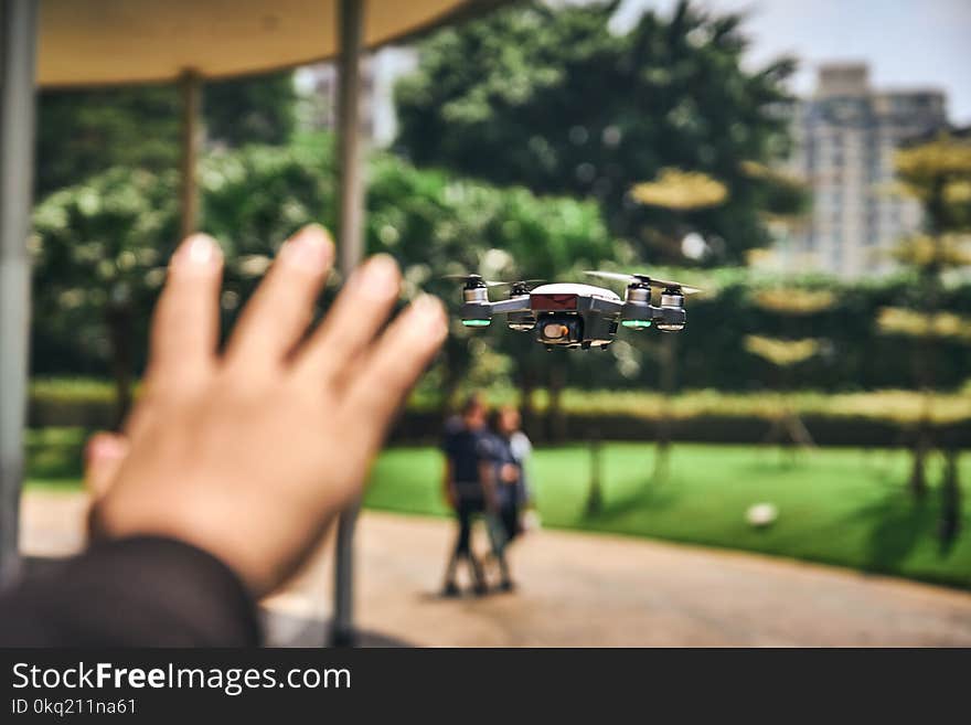 Focus Photography of Drone Flying