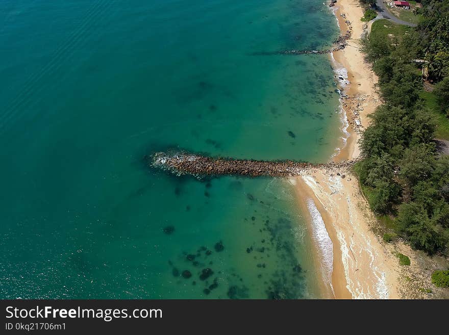 Body of Water Near Mountain