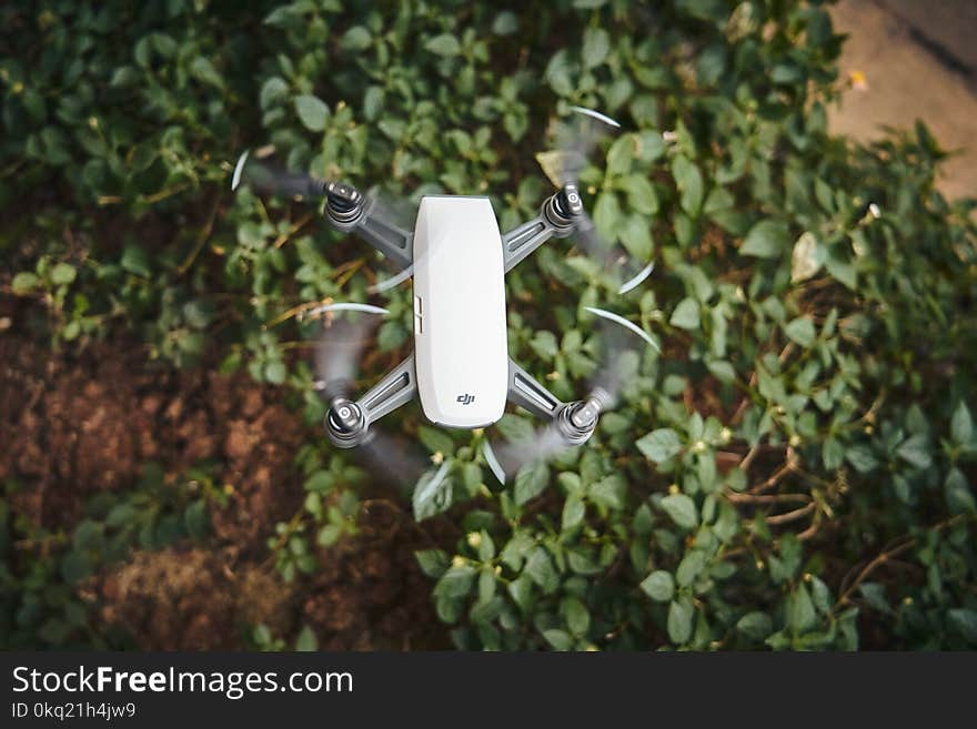 White and Gray Quadcopter Video Drone