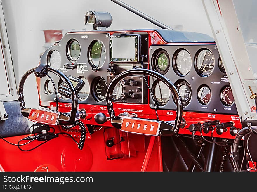 Red and Black Airplane Cockpit