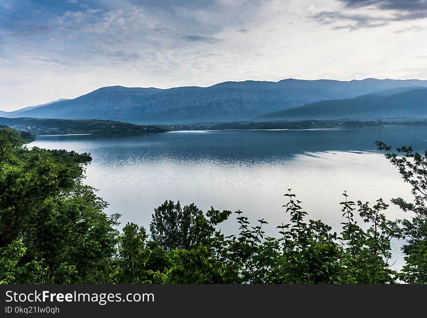 View of Body of Water and Mountains