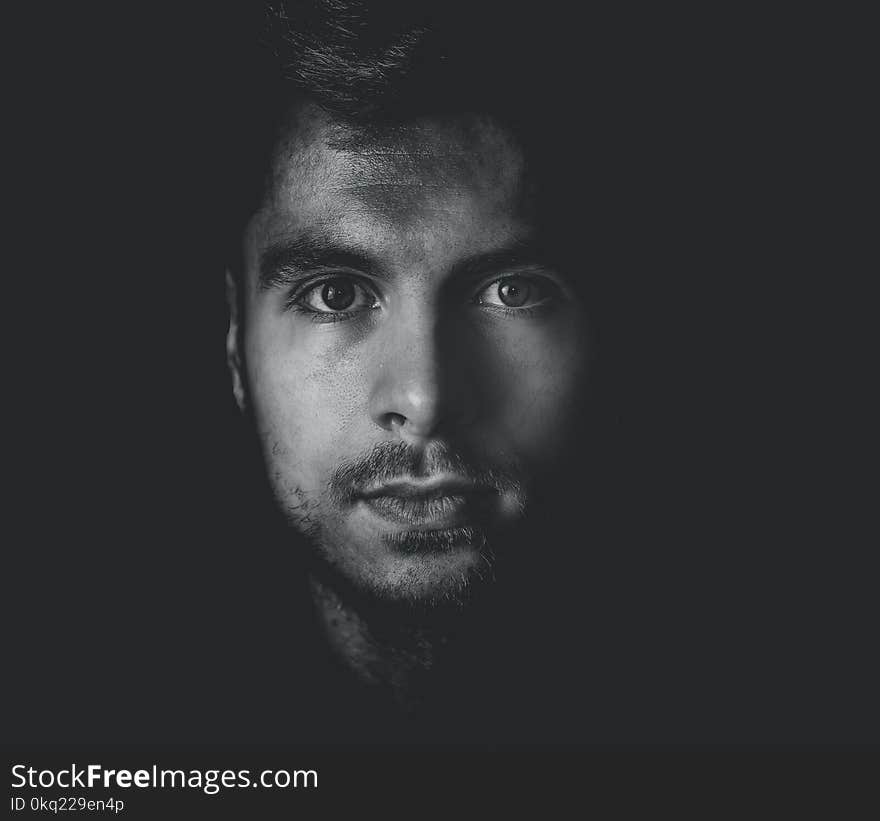 Grayscale Photo of Man&#x27;s Face