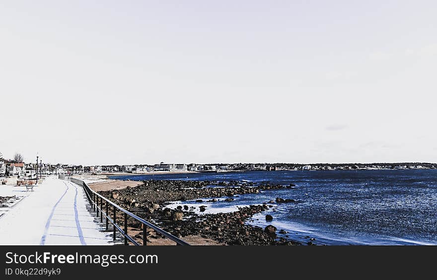 Aerial View of City Near Seashore