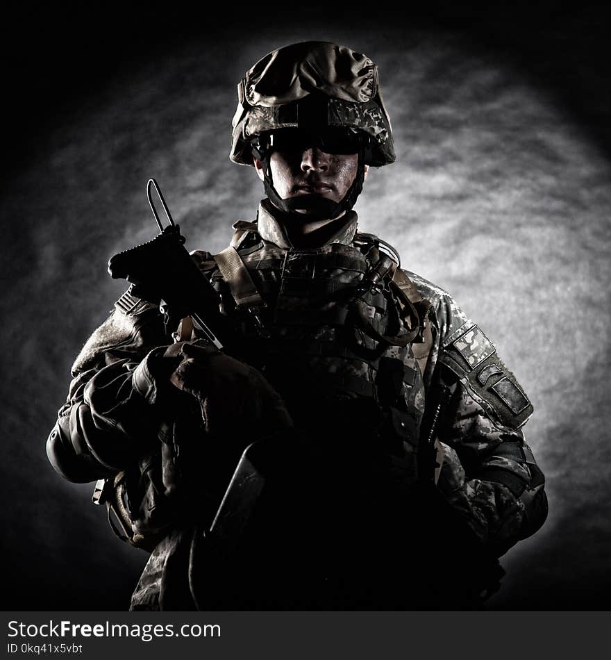 Soldier of special forces with assault rifle