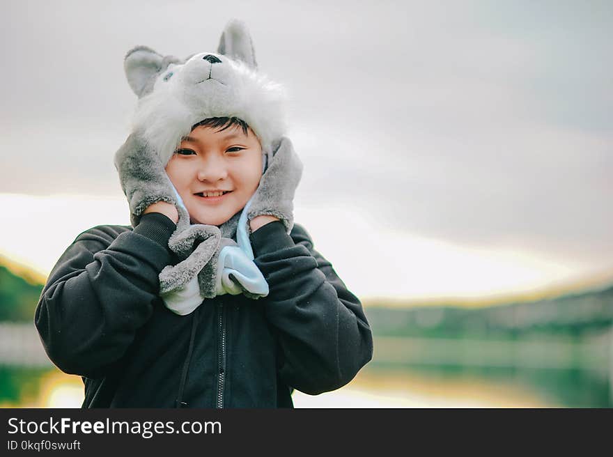 Boy Wearing Gray Dog Critter Hat