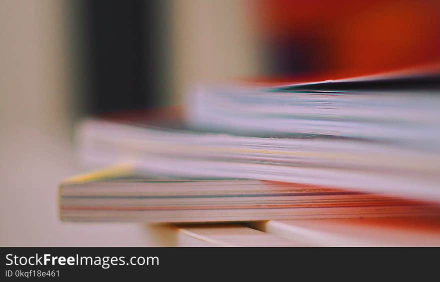 Selective Focus Photo of Thick Books