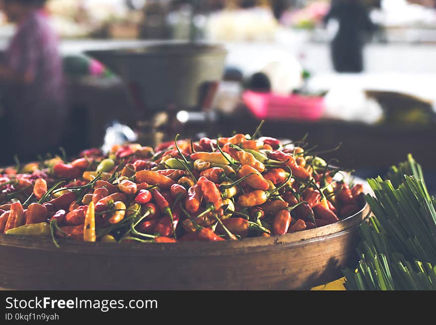 Focus Photo of Round Brown Wooden Bowl Filled With Chili Lot