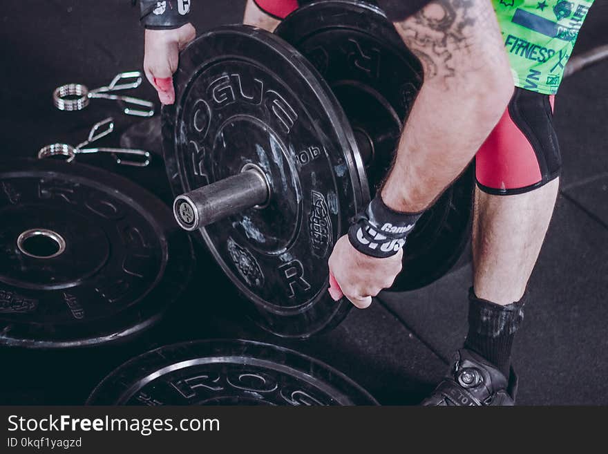 Person Holding Barbell