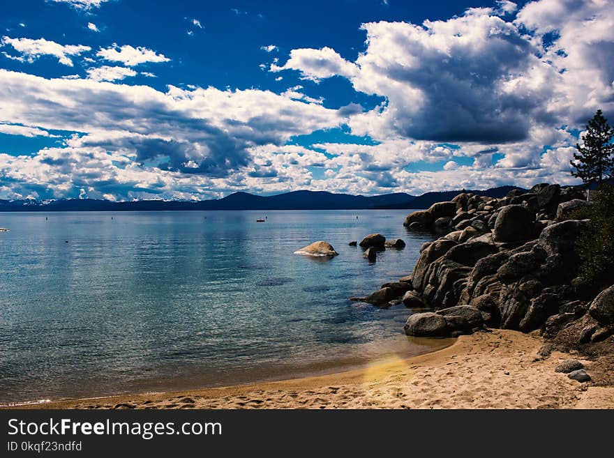 Blue Ocean Under White Clouds