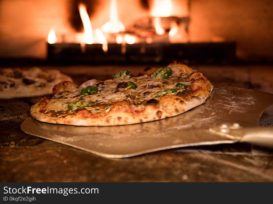 Baked Pizza on Pizza Peel in Oven