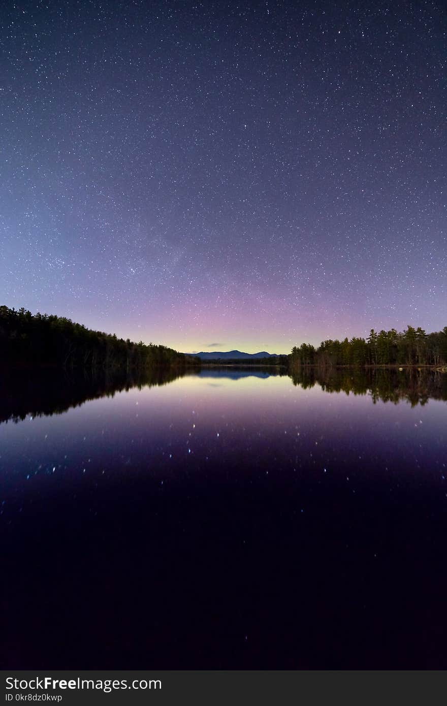 Blue Sea Under the Clear Sky during Night Time