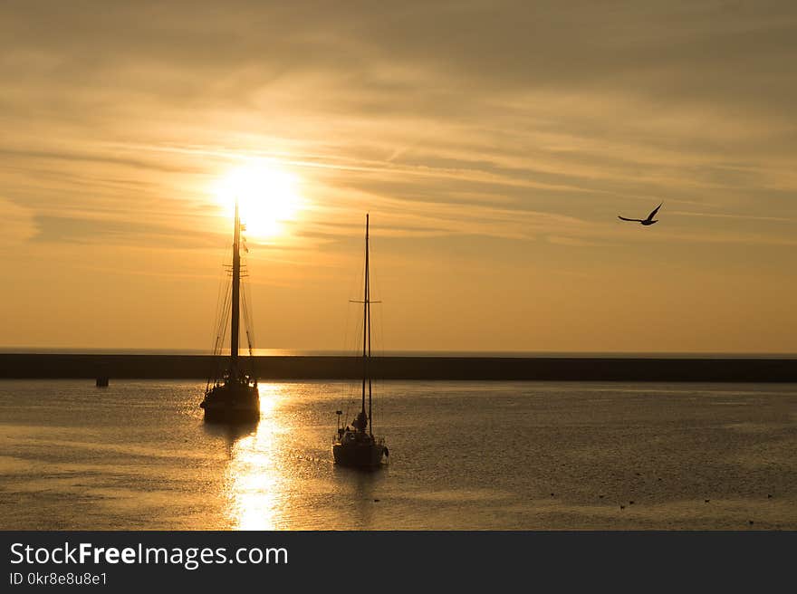 Two Boat on Ocean during Golden Time