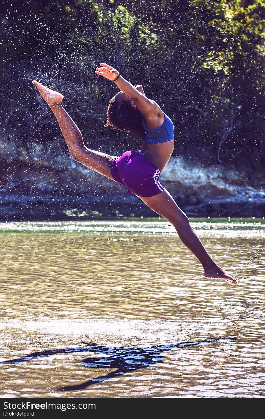 Woman Jump on Body of Water