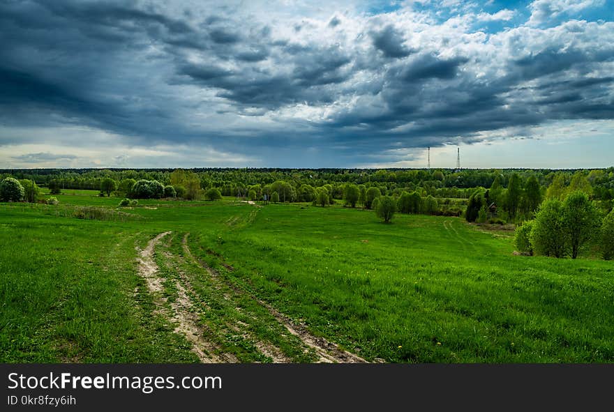 Gray Clouds Under Green Field