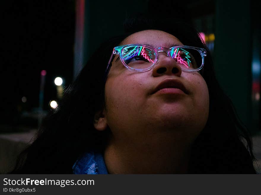 Woman Wearing Eyeglasses during Nighttime