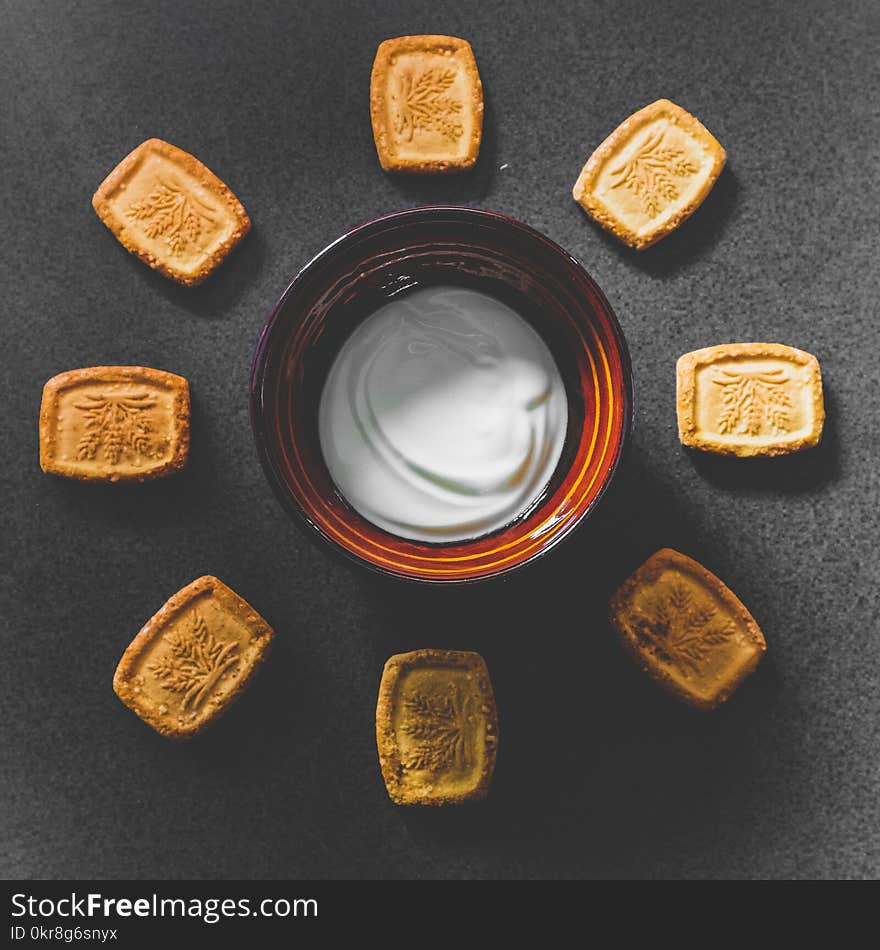 Bowl of Cream and Biscuits