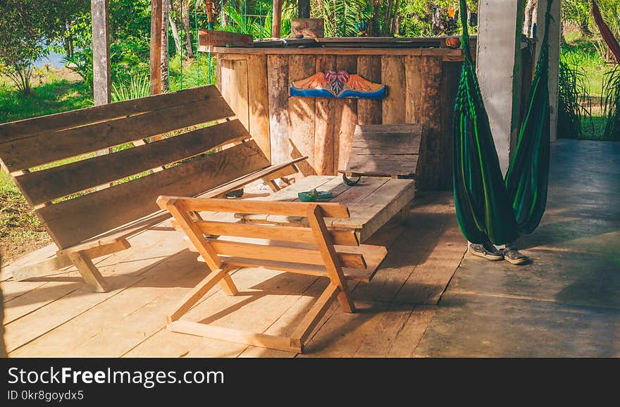 Green Hammock Near Wooden Patio Set