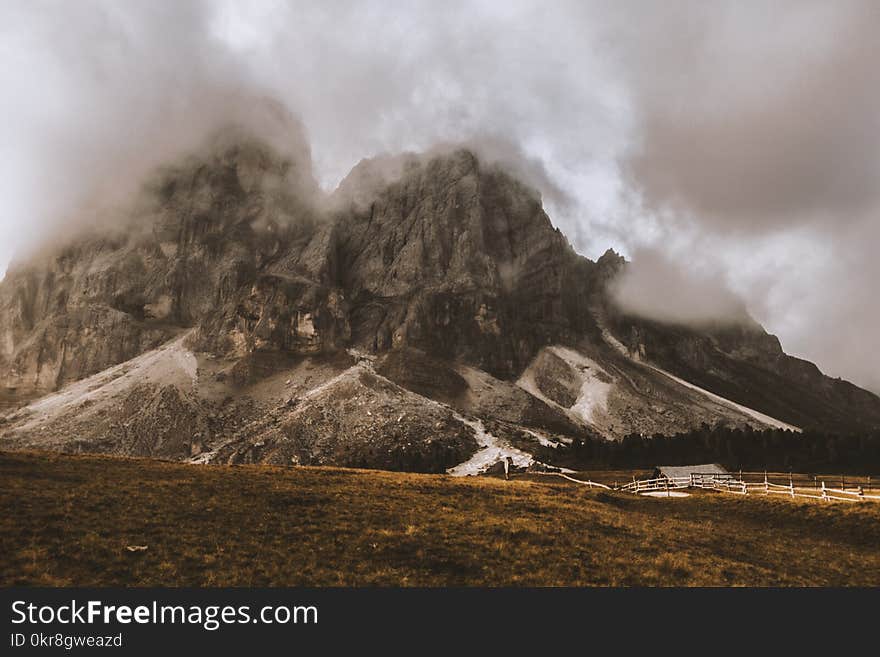 Gray House Under Gray and White Volcano&#x27;s Foot