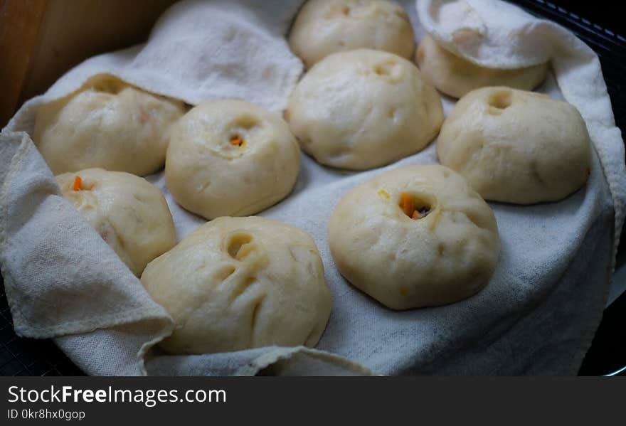 Dumplings on White Textile