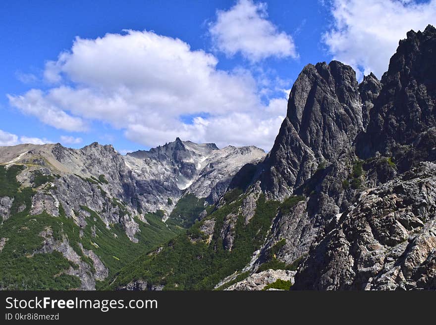 Gray Mountain Under White Cloud Blue Skies