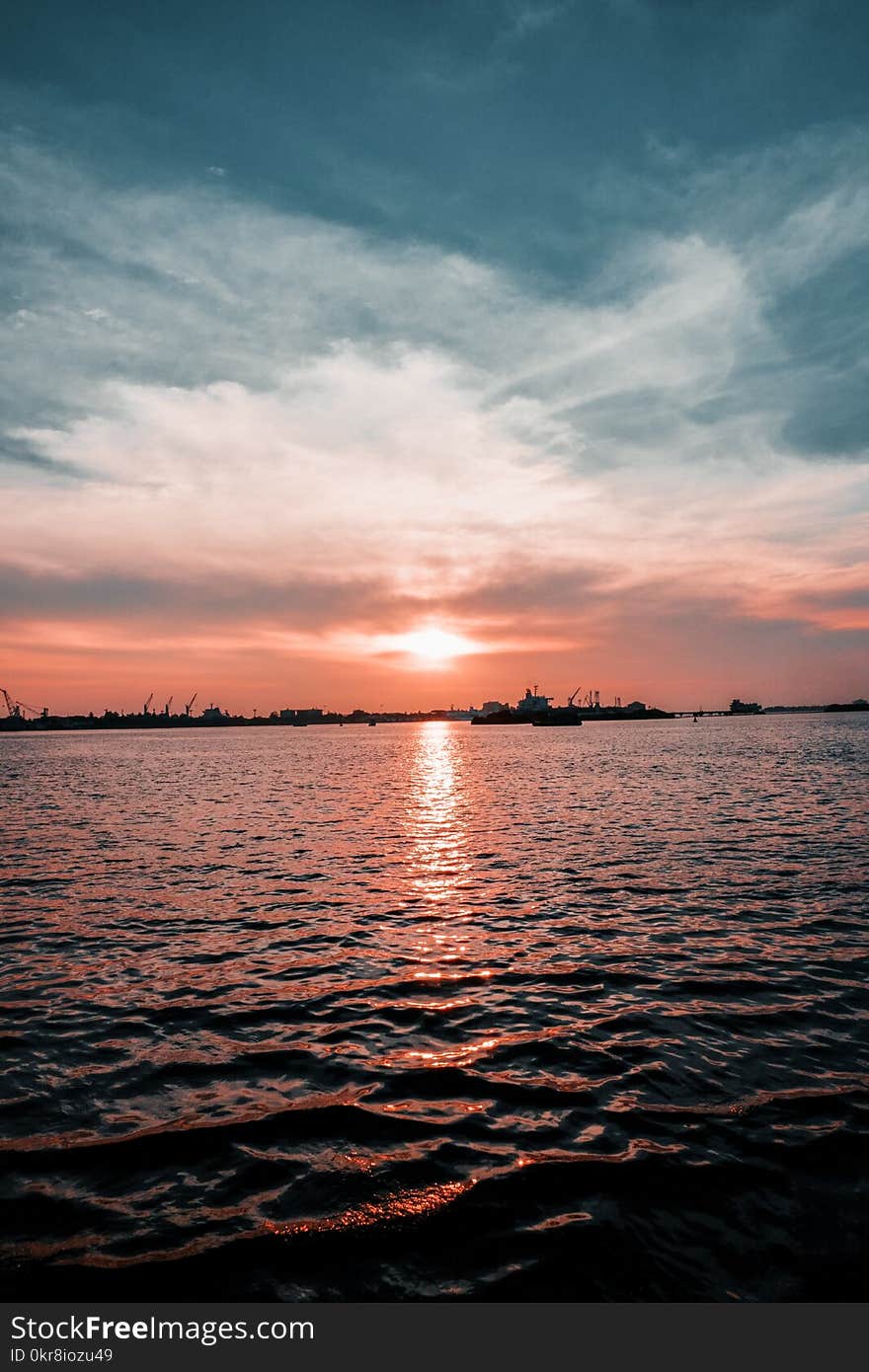 Photo of Calm Body of Water during Golden Hour