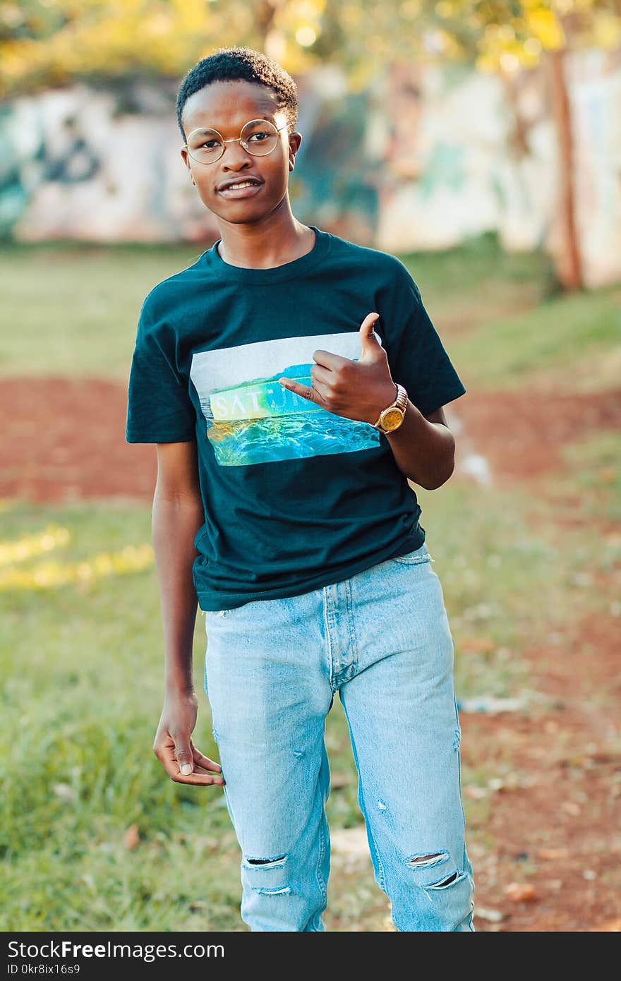 Photography of a Man Wearing Black Shirt