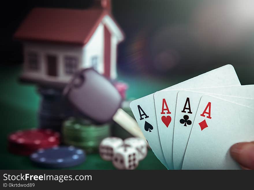 Four aces cards in poker player hand