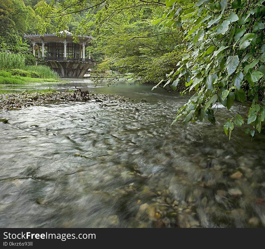 Panorama of a mountain river with a railway station. Architecture, station, railway, building,