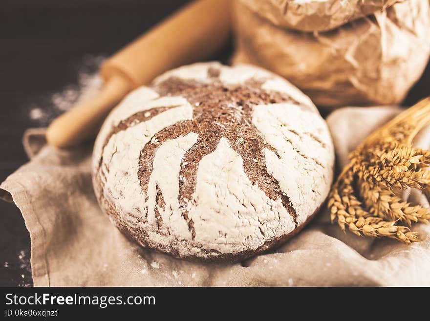 Bag of flour on wooden background