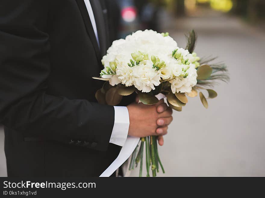 Wonderful luxury wedding bouquet of different flowers