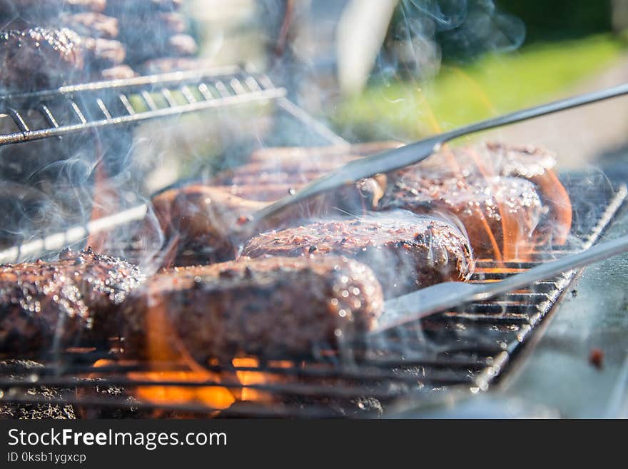 Close Photography of Grilled Meat on Griddle