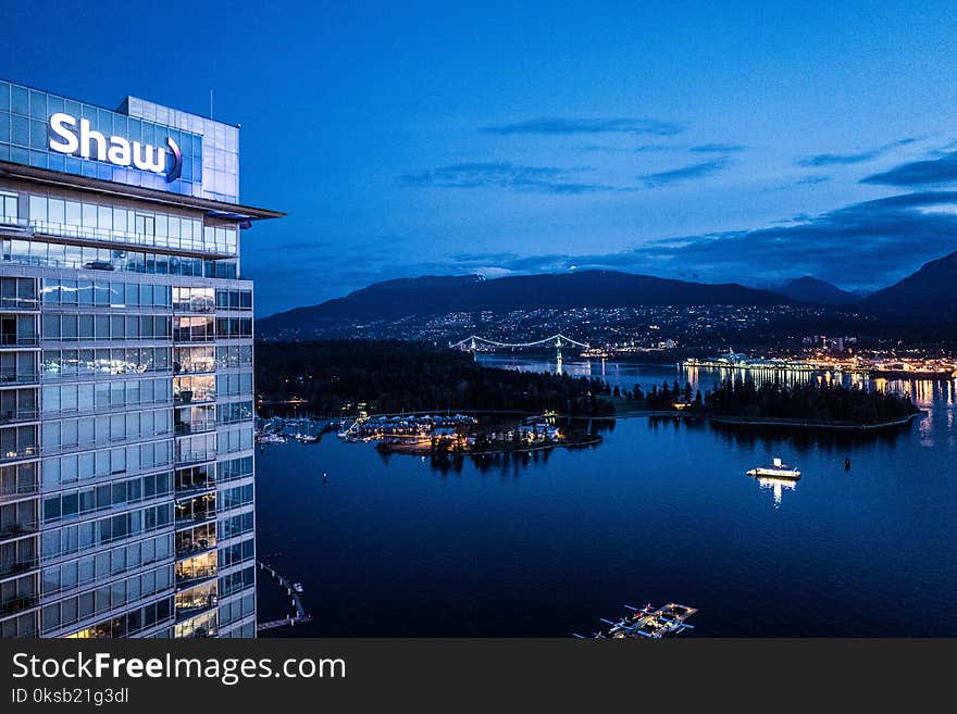 Mirror Building Near Body of Water