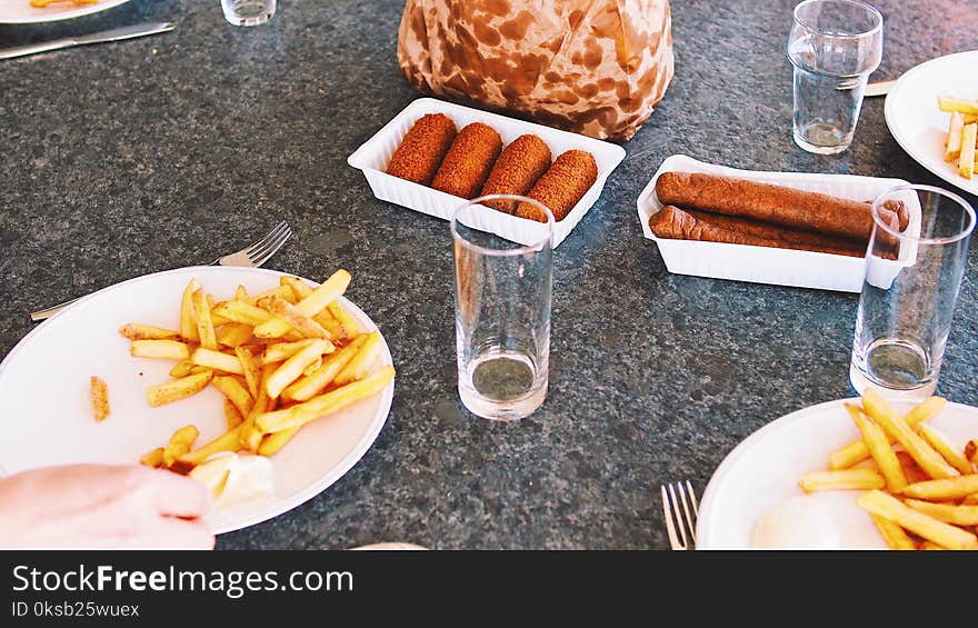 Photography of French Fries and Hotdogs