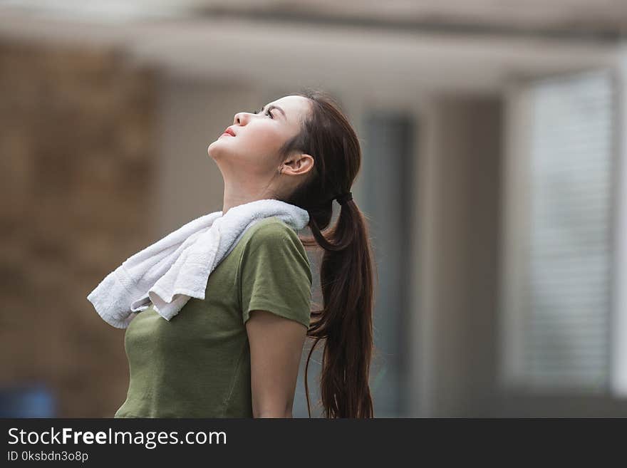 Female Take A Break After Exercising