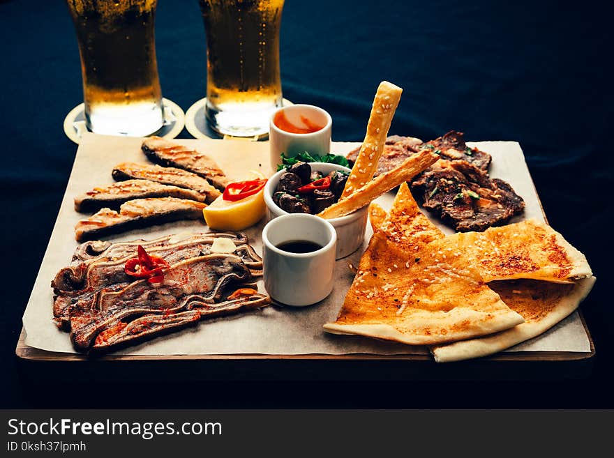 Fried appetizer beer sidedish on cutting board. Fried appetizer beer sidedish on cutting board