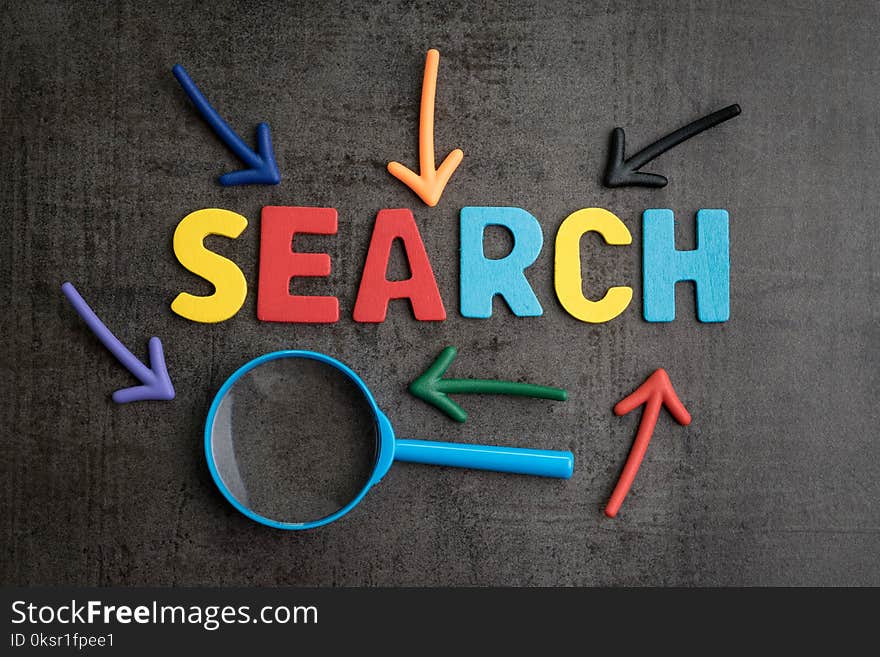 Search concept, best way finding website and content from the internet, result by SEO ranking, magnifying glass with arrows pointing to word SEARCH at the center of cement wall chalkboard.